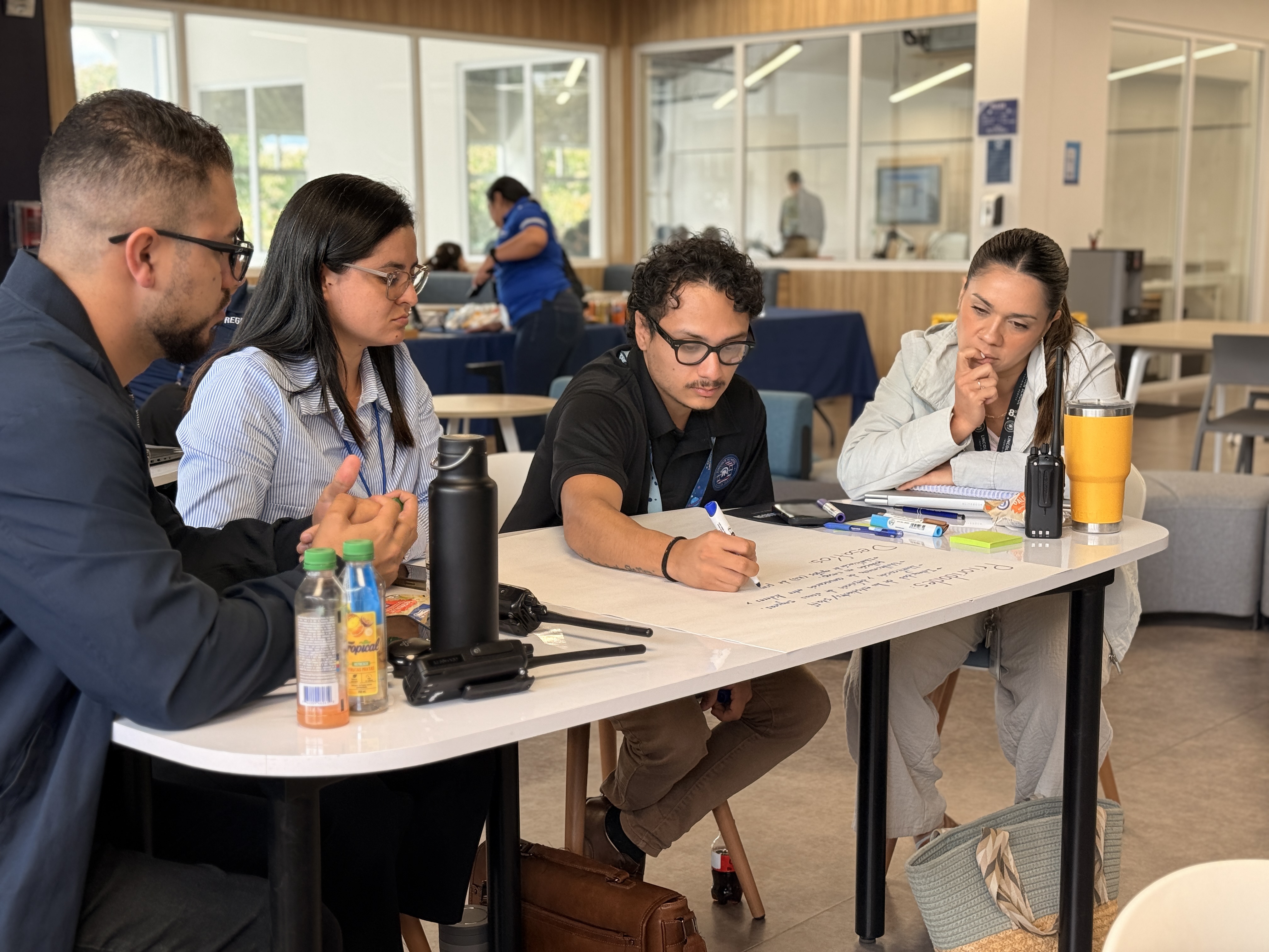 Participants working together during an active threat tabletop exercise.